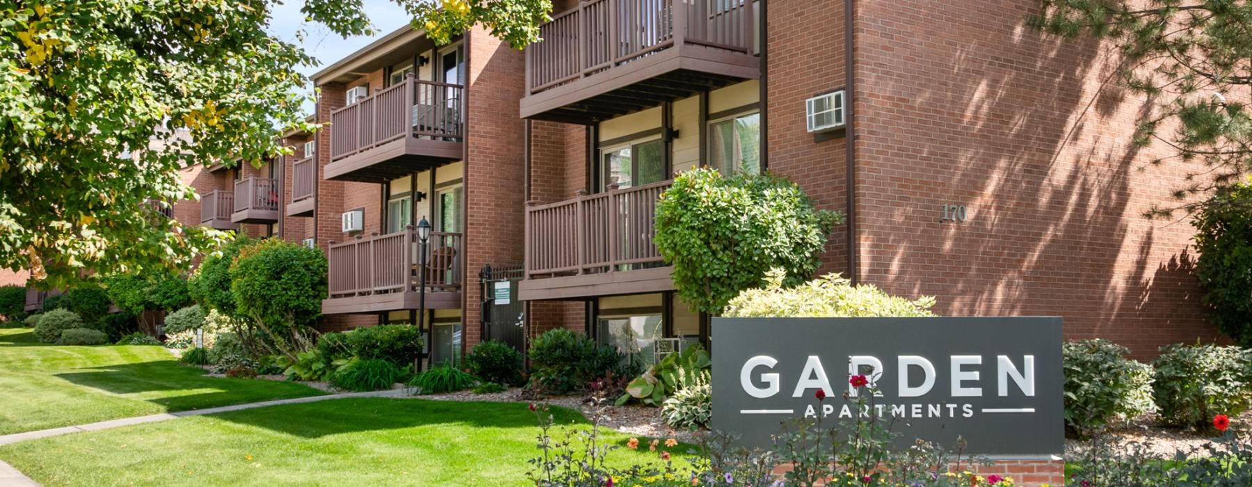 a sign in front of a building